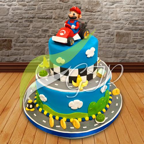 A chocolate cake with Super Mario characters and scenes made with fondant and icing on top